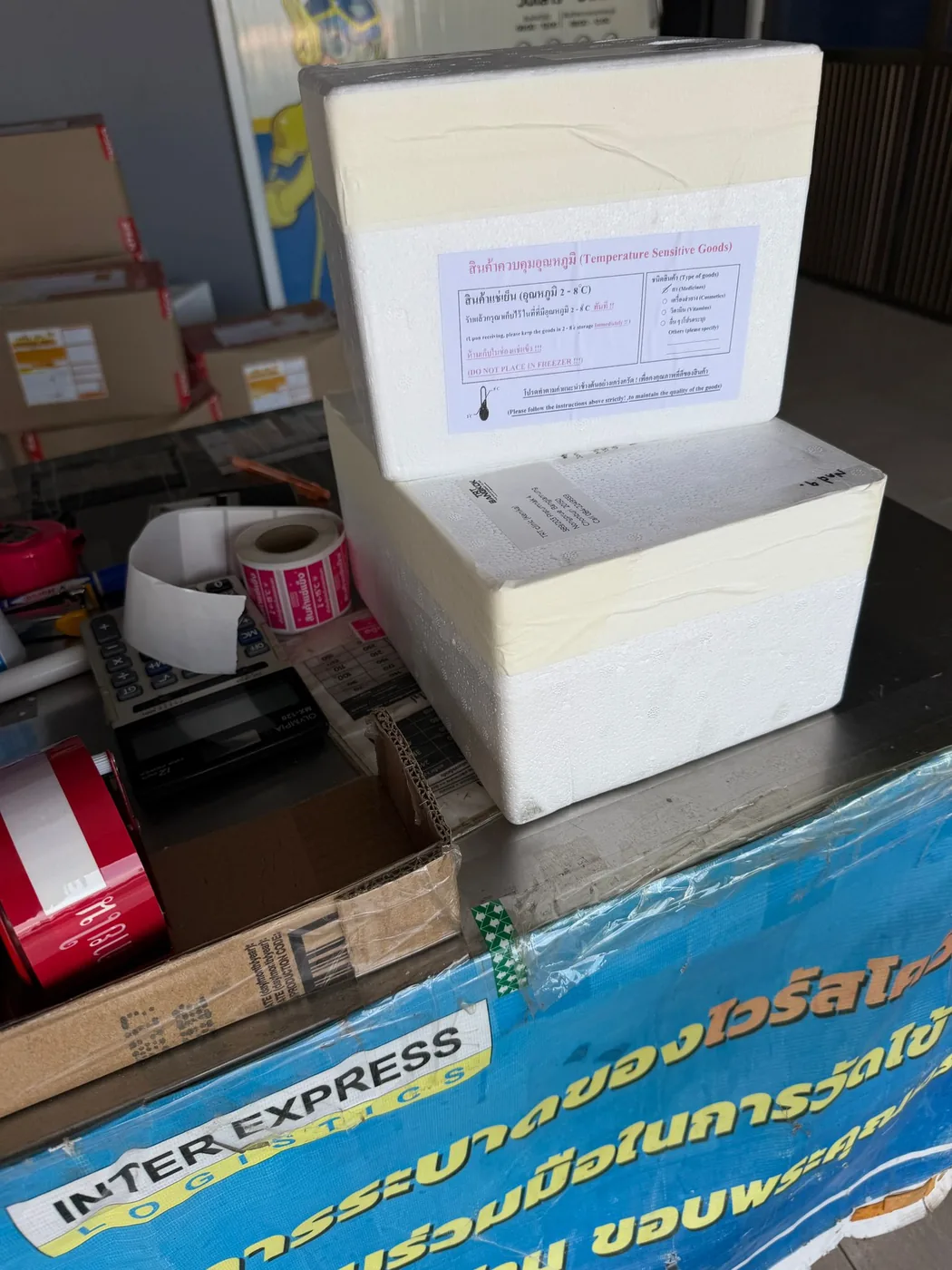Authentic Mounjaro packed cold from the TRT Bangkok clinic fridge into an insulated 2-8C cold-chain shipment box for nationwide delivery