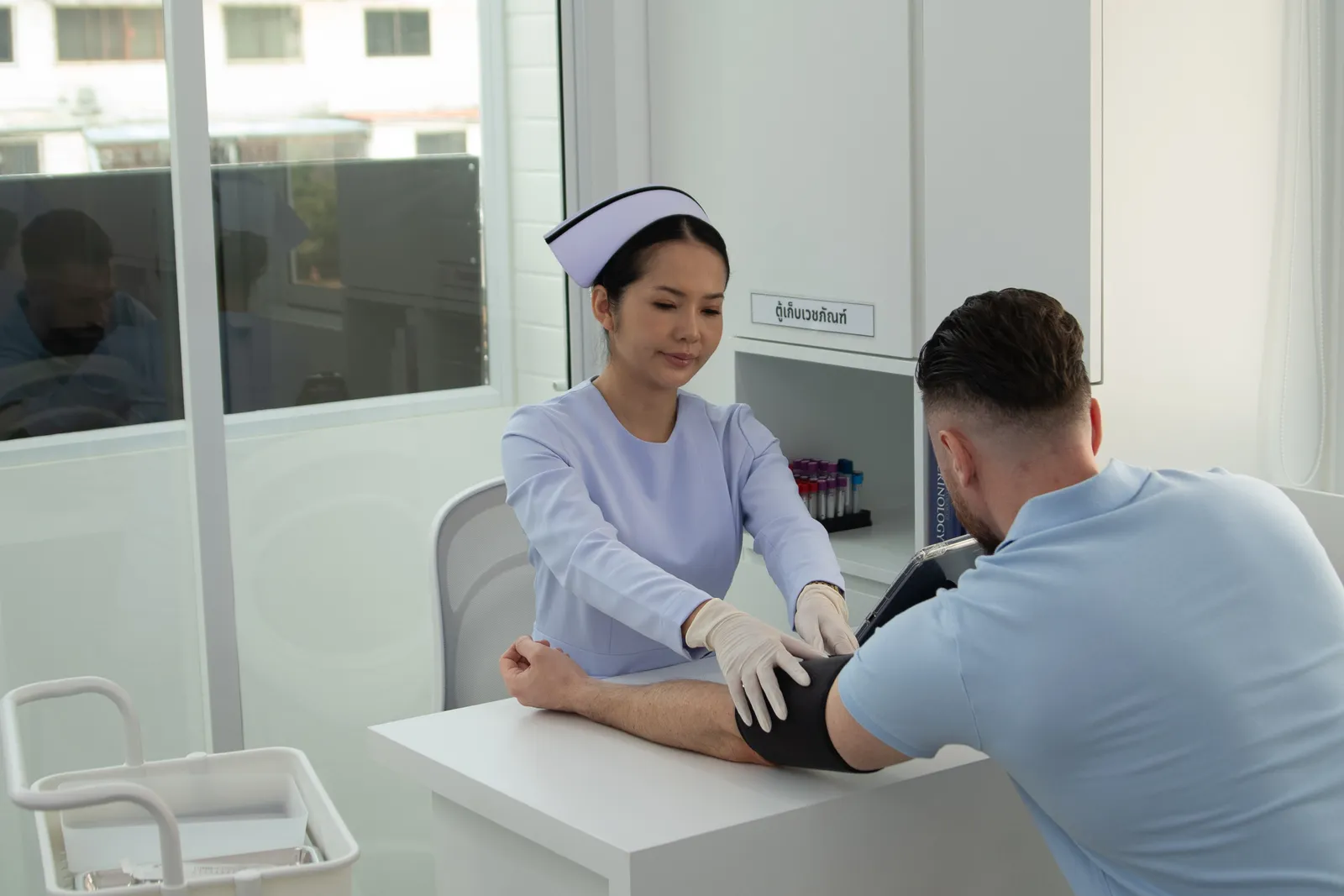 Nurse checking patient vitals before starting Retatrutide at TRT Bangkok Pattaya clinic