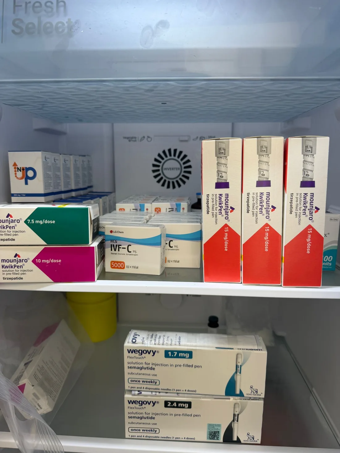 Authentic Mounjaro KwikPen and Wegovy FlexTouch semaglutide pens in the temperature-controlled cold-chain fridge at TRT Bangkok Clinic, Pattaya